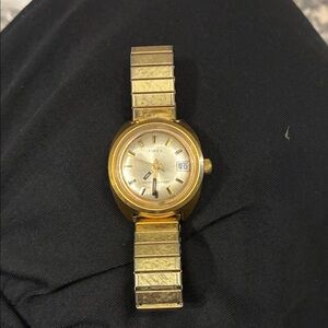 Timex Gold Watch with Date Display vintage mechanical